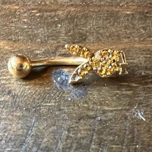 Playboy belly ring